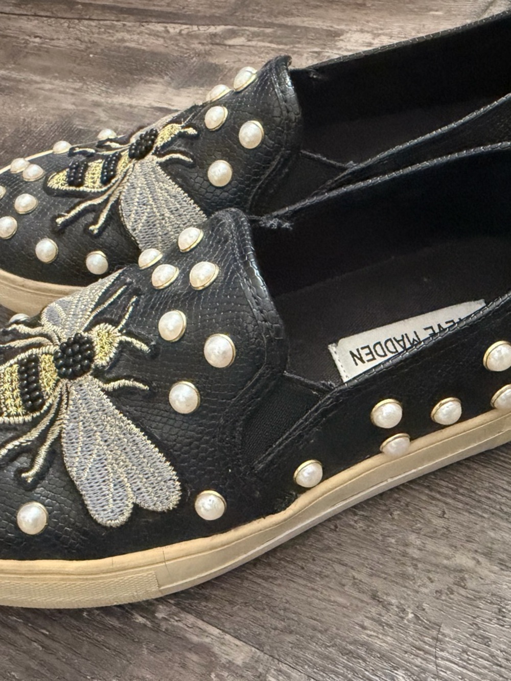 Steve Madden Black Slip-On Sneakers with Bee Embroidery and Pearl Studs